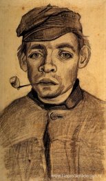 Hoofd van een jonge man met een pijp