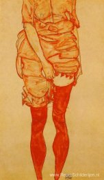 Staande vrouw in het rood