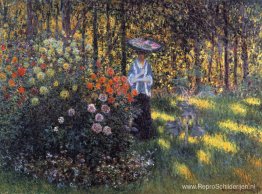 Vrouw met een parasol in de tuin in Argenteuil