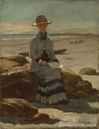 Jonge dame op het strand