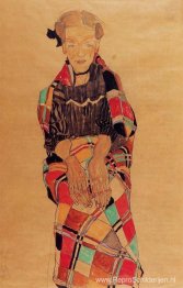 Meisje in zwarte schort, gewikkeld in een geruite deken