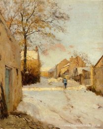Een dorpsstraat in de winter