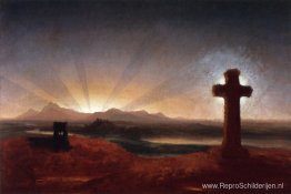 Kruis bij zonsondergang