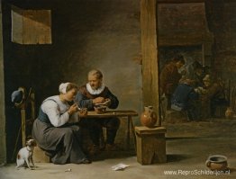 Een man en een vrouw die een pijp roken, zittend in een interieu Een man en een vrouw die een pijp roken, zittend in een interieu