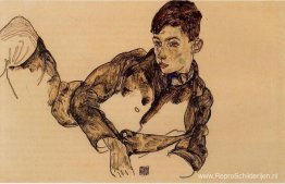 Liggende jongen leunend op zijn elleboog Liggende jongen leunend op zijn elleboog