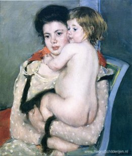 Reine Lefebvre houdt een naakte baby vast Reine Lefebvre houdt een naakte baby vast