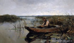 Visser op een polderkanaal Visser op een polderkanaal