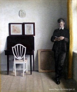 Interieur met lezende jongeman Interieur met lezende jongeman