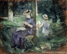 Vrouw en kind in een tuin Vrouw en kind in een tuin