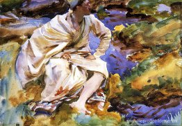 Een man gezeten aan een stroom Een man gezeten aan een stroom