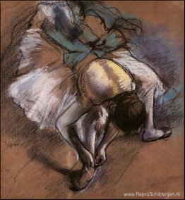 Danser die haar pantoffel aanpast Danser die haar pantoffel aanpast