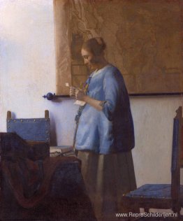 Vrouw die een brief leest (Vrouw in het blauw die een brief lees Vrouw die een brief leest (Vrouw in het blauw die een brief lees