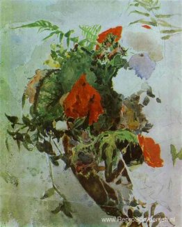 Rode bloemen en bladeren van Begonia in een mand Rode bloemen en bladeren van Begonia in een mand