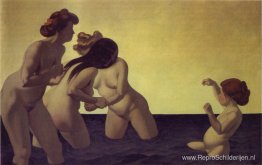 Drie vrouwen en een klein meisje spelen in het water Drie vrouwen en een klein meisje spelen in het water