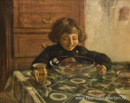 А kind zit aan een tafel А kind zit aan een tafel
