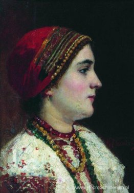 Portret van het meisje in een Oekraïense jurk Portret van het meisje in een Oekraïense jurk