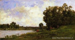 Vee aan de oever van de rivier Vee aan de oever van de rivier