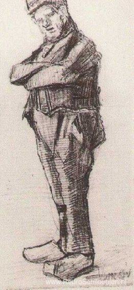 Man, staande met de armen over elkaar Man, staande met de armen over elkaar