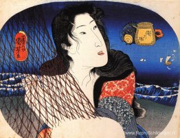 Vrouw die een visnet repareert Vrouw die een visnet repareert