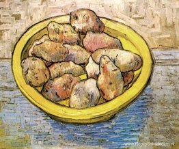 Stillevenaardappelen in een gele schotel Stillevenaardappelen in een gele schotel